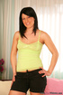 brunette poses with high