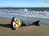 A mermaid with huge boobs washes up on the beach to sunbathe