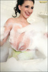 Steamy sensual bubble bath as busty brunette plays with foam on her perfect