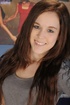 sweet brunette takes off