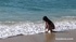 Babe with a natural body showing her sexy body on the beach