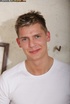 Gorgeous stud lifts up his white shirt and seduces with his hunk body