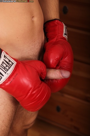 Hunk boxer displays his stunning body wearing his black head gear, red gloves, shorts and white supporter then gets naked and jacks off in his bedroom. - Picture 11