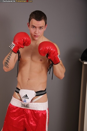 Gorgeous stud with big hard body takes off his black head gear, red and white shorts and black and white supporter then reveals his huge dick while he pose naked wearing his red boxing gloves. - XXXonXXX - Pic 5