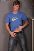 Cute dude takes off his blue shirt and shows his hunk body before he strips