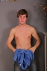 Cute dude takes off his blue shirt and shows his hunk body before he strips