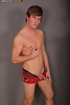 Cute dude takes off his blue shirt and shows his hunk body before he strips