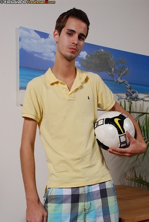 Cute soccer star takes off his yellow shirt and reveals his skinny body before he pulls down his green and black shorts and blue, black and white brief then teases with his long hard cock. - XXXonXXX - Pic 2