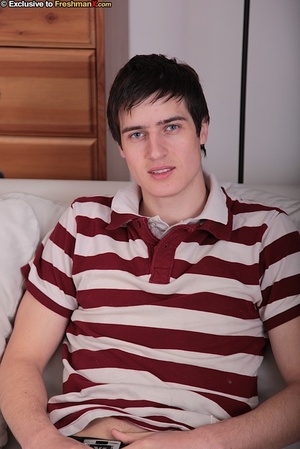 Gorgeous stud sits on a white couch then takes off his maroon and white striped shirt and shows his big muscles before he peels down his white slacks and black brief and expose his ass crack then displays his uncircumcised dick in different poses. - XXXonXXX - Pic 1