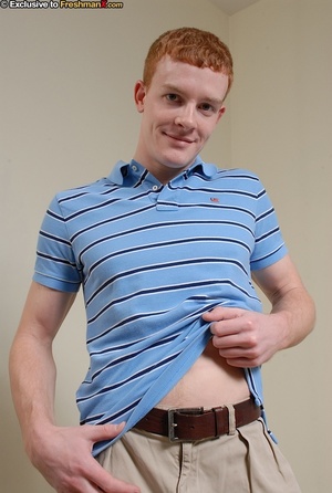 Redhead hottie shows his thin muscular body as he strips off his blue and black shirt and gray shorts before he peels down his black boxers and strokes his large dick on a wooden stool. - XXXonXXX - Pic 1