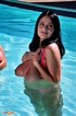 Two busty beauties decide to test the floatation devices in the pool