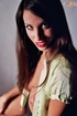 Sexy but shy brunette peeks her epic tits out of her yellow top