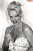 Gal with blonde hair does sexy pinup black and white photoshoot in revealing