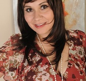 Enticing mature MILF strips off her dress and shows her hairy twat.