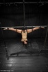 Very hairy pussy is caned hard, pinched and fucked roughly with a black