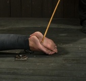 Gorgeous brunette’s body is bound with vet wrap during a hardcore BDSM