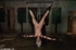 Whore is hung upside down and hosed in a makeshift dungeon, where her
