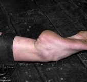 Even a blonde’s fingers are strapped down as her hot, little breasts