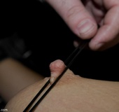 Fireball is bound to a wagon wheel, then a series of painful happenings