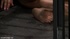 Metal leg and arm-spreader bars are placed on a pair of subs who favor