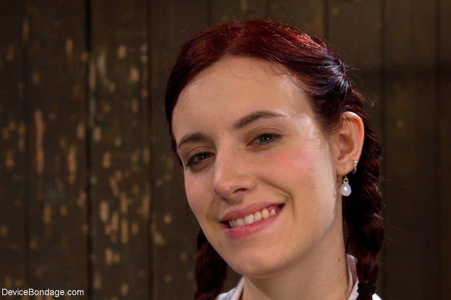 Chains hold a red-haired harlot against the - XXX Dessert - Picture 1