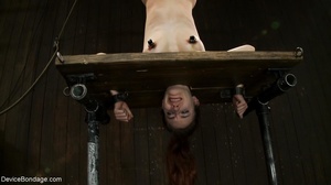While she is bound and suspended upside  - Picture 12