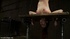 While she is bound and suspended upside down, a bitch’s head is submerged
