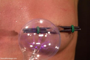 A violet wand is used on a darling submi - Picture 5