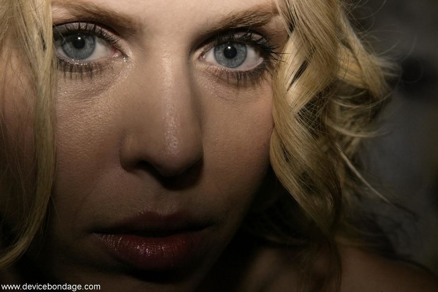 Bars and leather straps keep this great-looking blonde in one place for her slave training. - XXXonXXX - Pic 2