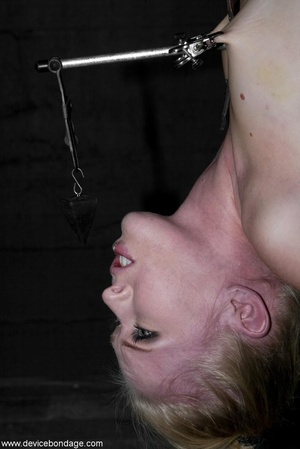 Fantastic fuck toy is suspended in the air while she’s swathed in a white straitjacket. - XXXonXXX - Pic 5