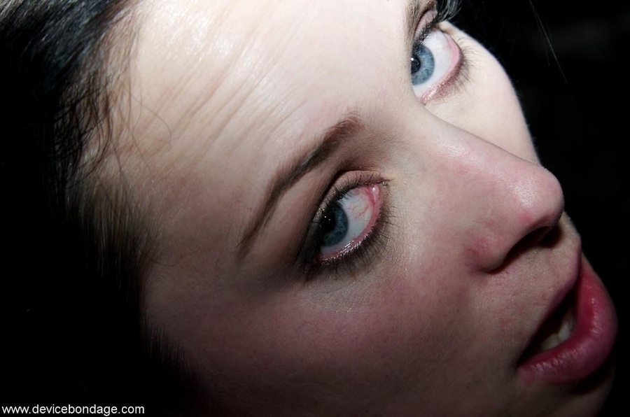 Young slave is bound to a pillar in a darkened space, but there is light on her pretty face. - XXXonXXX - Pic 13