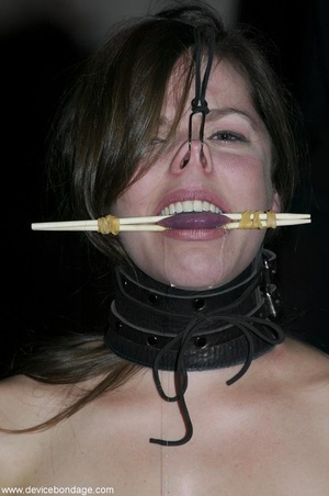 This slave doesn’t even look like a regular girl anymore, as her nose is pulled, and her tongue is pinched. - Picture 15