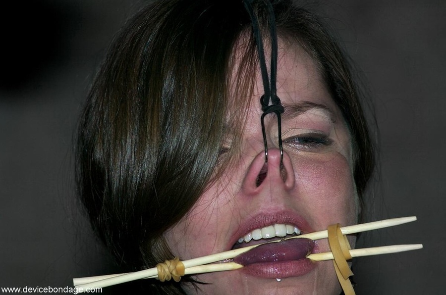 This slave doesn’t even look like a regular girl anymore, as her nose is pulled, and her tongue is pinched. - XXXonXXX - Pic 17