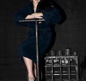 Brunette slave looks happy and cozy in a black robe after her exacting