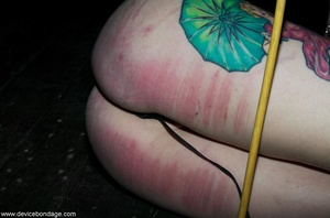 Caning leaves the backs of this slave’s thighs pink as can be, but she likes being wounded. - Picture 12