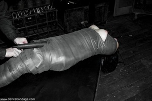 Bodacious bitch into bondage agrees to her hot body being mummified with vet wrap. - Picture 16
