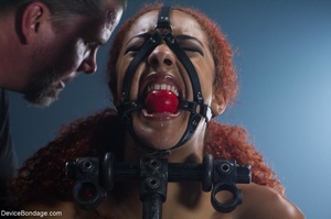 Ebony with red hair is no stranger to BDSM, but this session proves to be especially daunting. - Picture 15