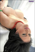 dark haired lady green