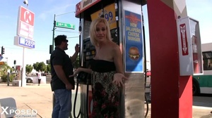Gorgeous blonde wearing multi colored tube dress pulls down her black panty and reveals her indulging pussy on a gas station. - XXXonXXX - Pic 4