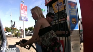 Gorgeous blonde wearing multi colored tube dress pulls down her black panty and reveals her indulging pussy on a gas station. - XXXonXXX - Pic 6