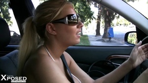 Gorgeous blonde with striking body in white dress reveals her big juggs while driving her car. - XXXonXXX - Pic 1