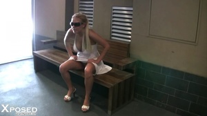 Banging blonde displays her lusty body as she walks around in public wearing her stunning white dress with sunglasses before she pulls up her skirt and expose her indulging pussy. - Picture 9