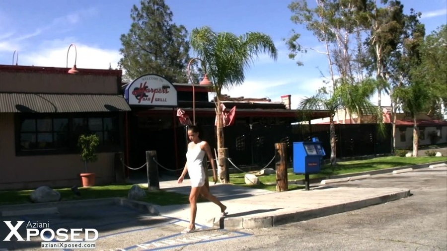 Stunning babe displays her hot curves wearing her sexy white dress while she drinks beer in a bar. - XXXonXXX - Pic 8