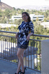 Playful honey with glasses shows her hairy twat outdoors