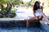 Super naughty young lady drills her twat in the fountain
