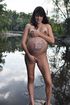 Beautiful pregnant brunette takes off clothes in public to masturbate
