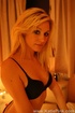 This amazing beautiful blonde undresses for a very sexy bubble bath