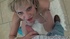 Blonde vixen with huge tits in skimpy blue bikini enjoys giving oral