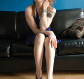 Gorgeous blonde with tattoos shows off her hot pussy and sweet tits