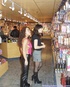 Two porn starts get nasty in a lesbian action at a sex toy store